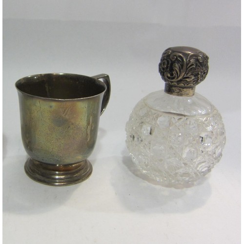 4462 - A silver topped scent bottle and a christening mug (2)