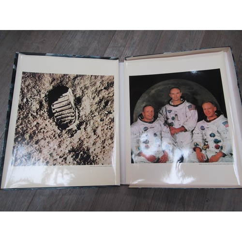 8177 - An Omega moon watch, Apollo XI photographs, commemorative box, 20 photographs and four leaves of tex... 