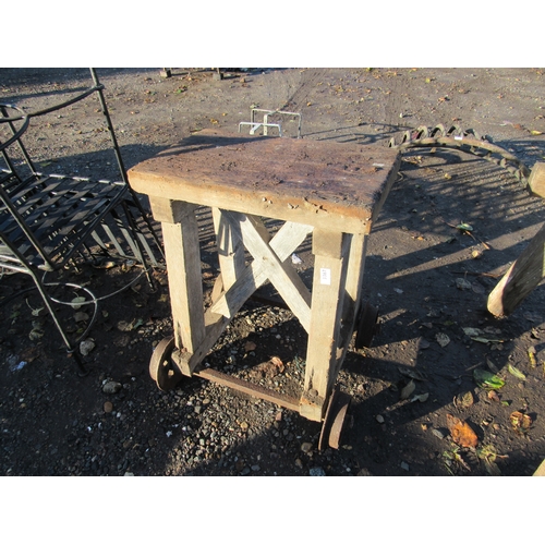 3248 - A bygone railway work table on cast wheels