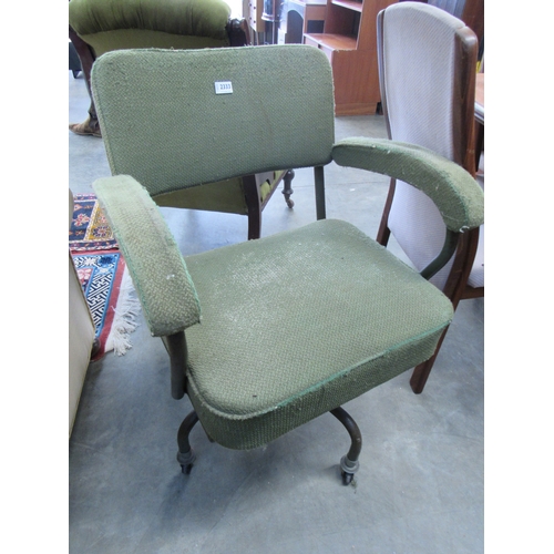 3240 - A mid 20th Century office armchair with tublar metal frame        (E) £3-5