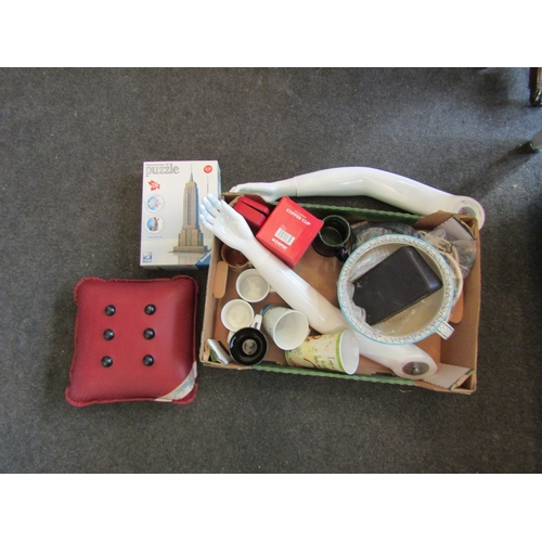 1225 - A box of miscellaneous including mannequin hands and arms, ceramic mugs, massage cushion, etc.  (R) ... 