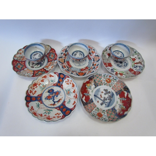 1243 - Five late 19th/early 20th Century Oriental Imari style plates painted with foliage and figures, (22c... 