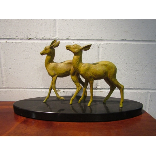 1249 - A painted metal figural group of deer on shaped base, 28cm tall x 53cm long  (R)  £25