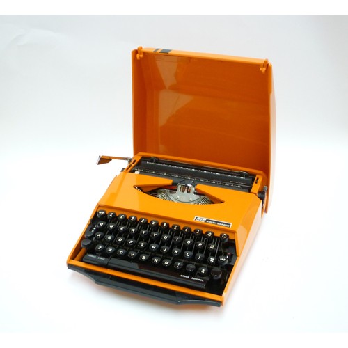 1335 - A Smith Corona GT Typewriter in orange, 'Design by Ghia'