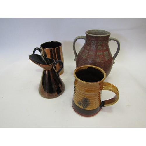 1346 - A 20th Century studio pottery terracotta tankard with mocha ware style seaweed decoration, a twin ha... 