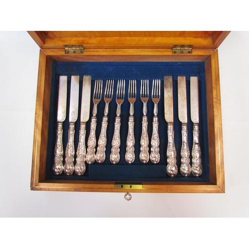 1344 - A canteen of silver handled twelve knives and forks, housed in an oak box with brass cartouche   (R)... 