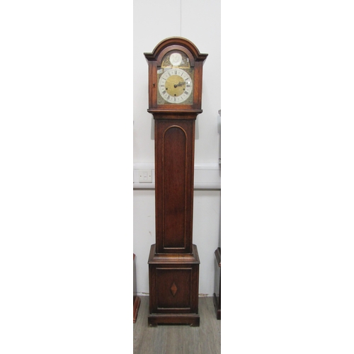 8011 - An oak cased Westminster chime Grandmother clock with brass face, Roman numerated dial and outer sec... 