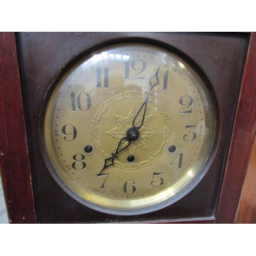 8016 - A mid 20th century mahogany wall clock with key and pendulum, 79cm tall x 32cm