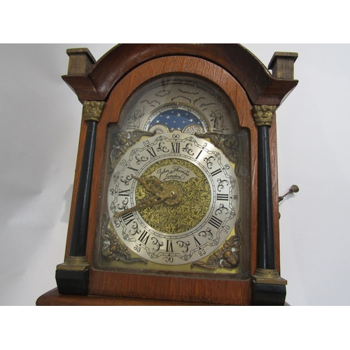 8027 - A John Thomas of London reproduction Dutch style wall clock with pendulum and two weights, 66cm tall