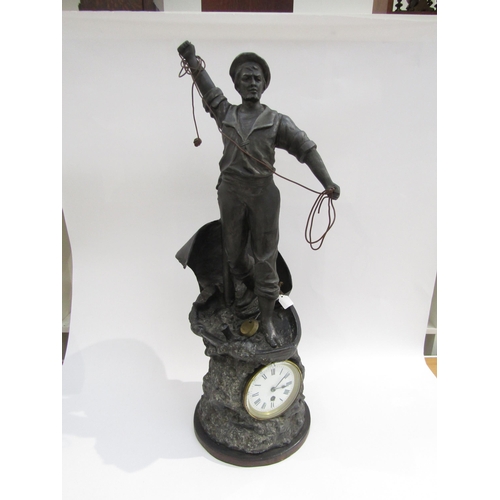 8031 - A large figural timepiece 'Sounding the Depth', spelter figure of a sailor casting a plumb line (wit... 