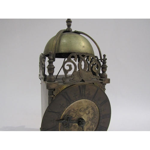 8048 - A brass lantern clock marked Coventry Astral, made in England, engraved dial with Roman numerals and... 