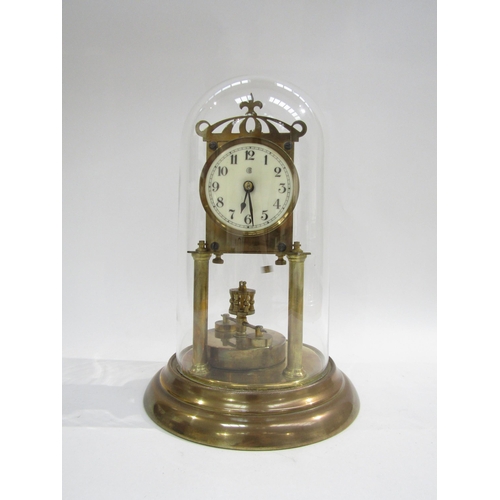 8050 - A 20th Century glass domed anniversary clock raised on a stepped circular base with front turn colum... 