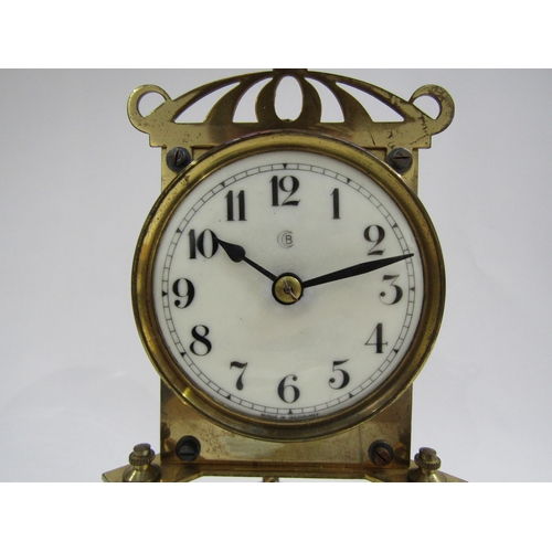 8052 - A 20th Century glass domed anniversary clock, made in Germany, raised on a stepped circular base wit... 