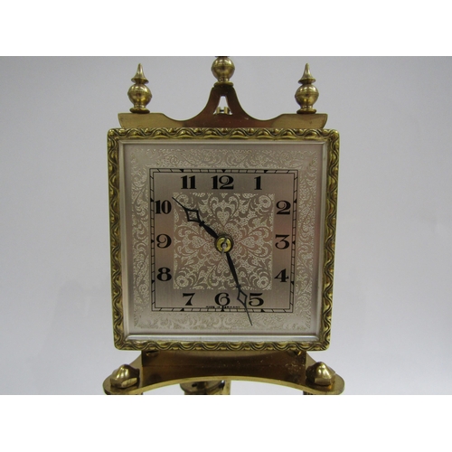 8054 - Two ornate anniversary clocks under glass domes - one with ornately engraved arch face, Arabic numer... 
