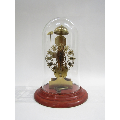 8056 - A brass kieninger skeleton clock, movement stamped AJK, under glass dome. Pierced dial with Roman nu... 