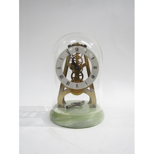 8057 - A small onyx base skeleton clock under glass dome, with Roman numeral dial and key, 18cm tall