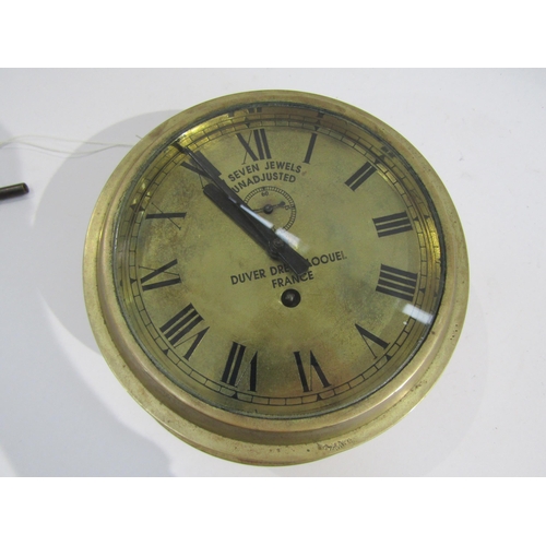 8063 - A brass bulkhead clock by Duver Drey Bloouel, France, seven-jewel unadjusted movement, brass dial wi... 