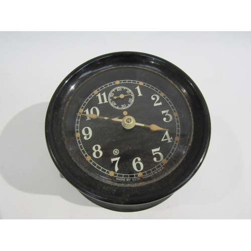 8065 - A WWII US navy mark I-boat clock, 1941, housed in bakelite case, No. 10668. No key. 9cm diameter dia... 