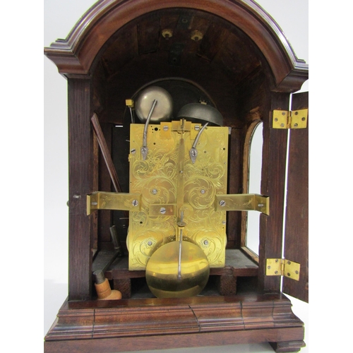 8072 - A late Georgian twin fusee bracket clock, the ornate engraved arch face named 