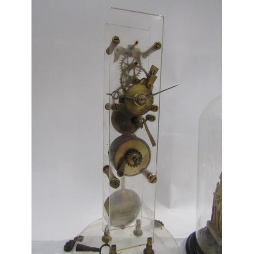 8074A - A skeleton clock under glass dome, single fusee, together with a Cathedral style timepiece under gla... 