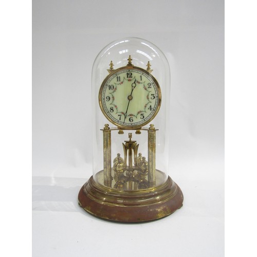 8041 - A brass anniversary clock under glass dome, with enamel dial, floral embellishment and Arabic numera... 