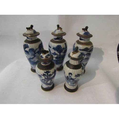 1478 - Five 19th Century Chinese blue and white crackle ware vases and covers, all a/f