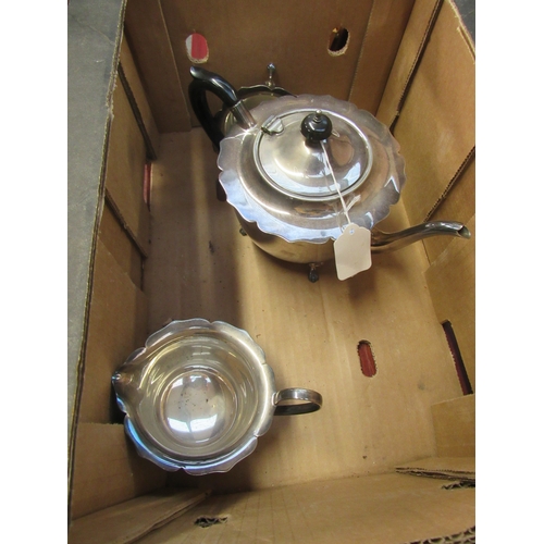 1263 - A silver plate three piece tea set