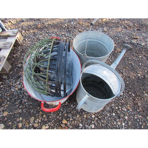 3353 - A galvanised watering can and pail, enamel and wire baskets