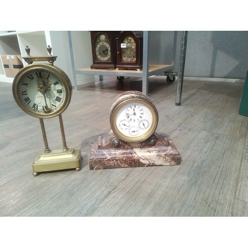 8026 - A box of assorted timepieces including interesting year going metal marble effect mantel clock with ... 