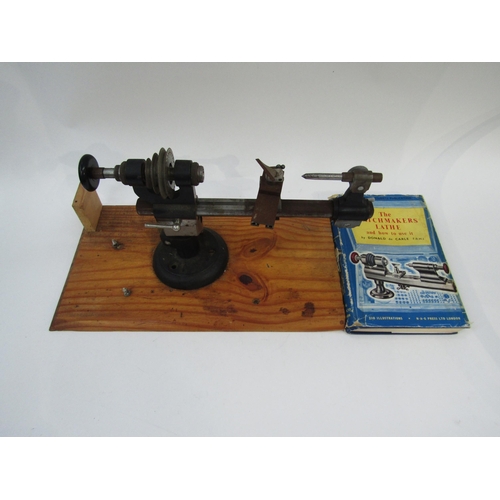 8181 - An 8mm watchmaker's lathe for restoration, with a box of various collects and runners, together with... 