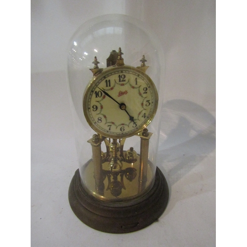 1485 - A Schatz German anniversary clock under glass dome. No key  (D)