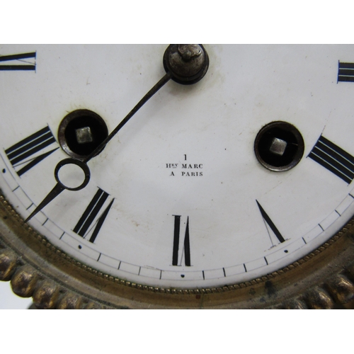 8070 - A French ornate gilt metal clock with cherub holding lamb on plinth base, enamel Roman numeral dial,... 