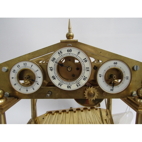 8077 - A Congreve Rolling Ball brass clock with our column frame and central zigzag track for the ball, an ... 