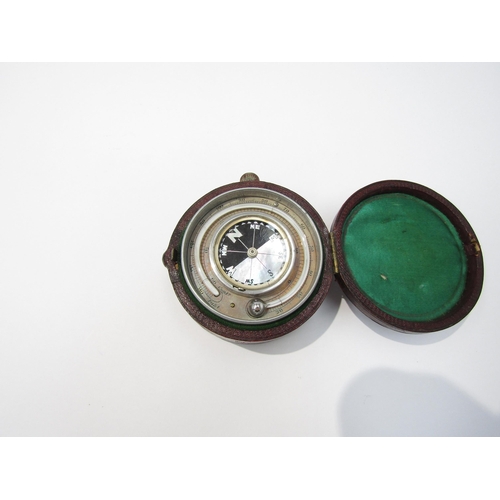 8090 - A leather cased compass/hydrometer and stopwatch with mother of pearl compass face and barometer