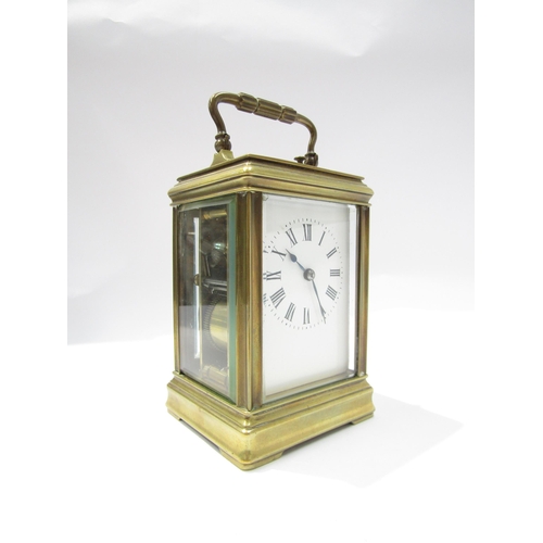 8091A - A 20th Century brass cased carriage clock, the movement marked R&Co. 12cm tall