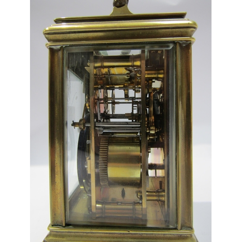 8091A - A 20th Century brass cased carriage clock, the movement marked R&Co. 12cm tall