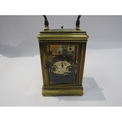 8091A - A 20th Century brass cased carriage clock, the movement marked R&Co. 12cm tall