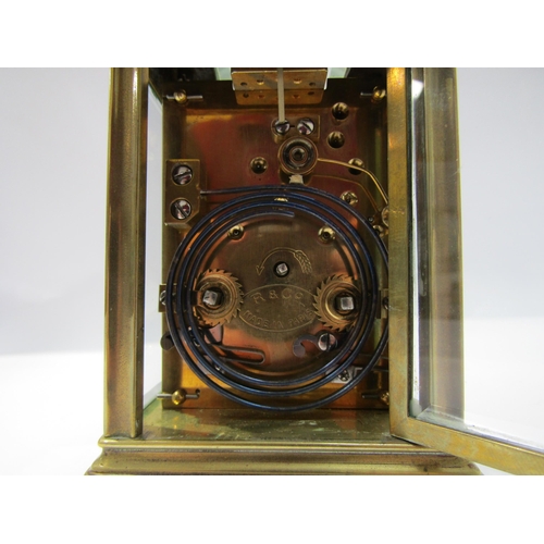 8091A - A 20th Century brass cased carriage clock, the movement marked R&Co. 12cm tall