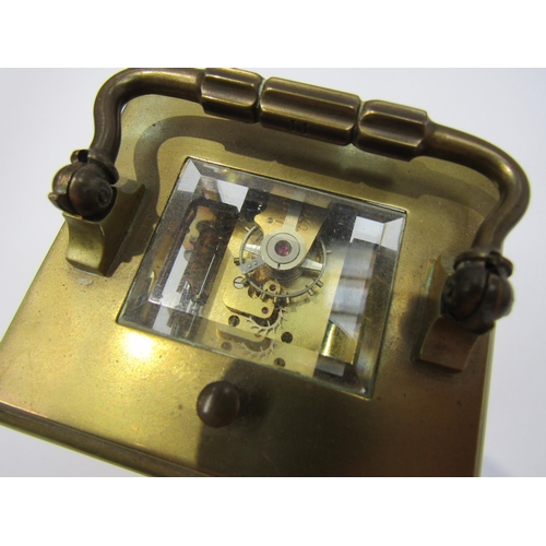 8091A - A 20th Century brass cased carriage clock, the movement marked R&Co. 12cm tall