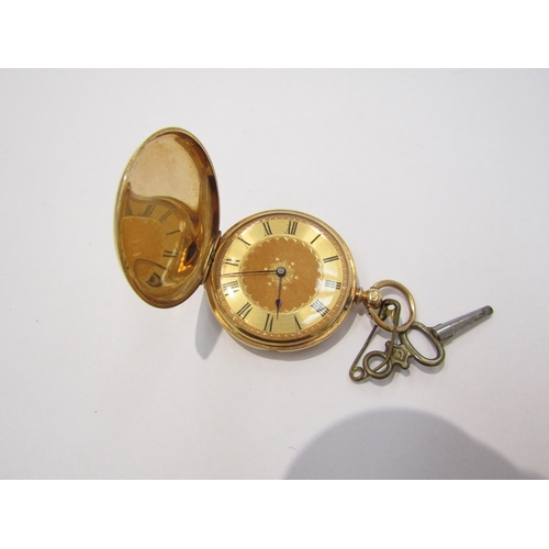 8171 - An 18k gold small closed case pocket watch, engraved central dial with black Roman numerals and engr... 