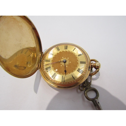 8171 - An 18k gold small closed case pocket watch, engraved central dial with black Roman numerals and engr... 