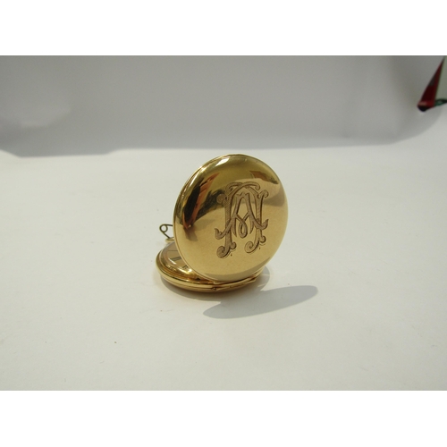 8171 - An 18k gold small closed case pocket watch, engraved central dial with black Roman numerals and engr... 