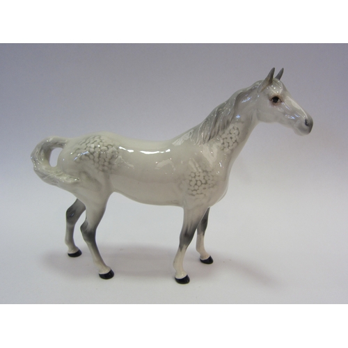 1014 - A Beswick Swish Tail Horse in grey gloss, model no. 1182 (ear a/f)