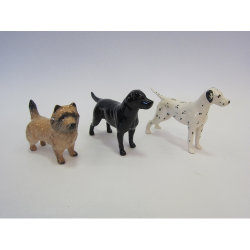 1023 - Three Beswick small dogs - Dalmatian in gloss, model no 1763, Cairn Terrier in gloss, model no. 2112... 