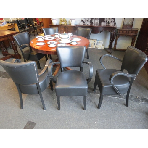 1055 - Six leather and bentwood armchairs with studwork detailing