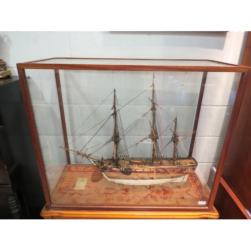 1058 - A model of HMS Bounty (1787) within display case, case 73cm tall x 87cm wide x 37cm deep  (E)  £50-7... 