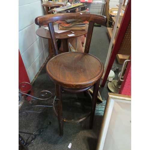 1100 - A bentwood office clerk's high stool with back, early 20th Century, 28