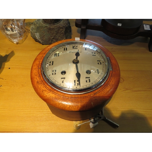 1118 - A mid-20th Century wall clock, marked Bravingtons, circular mahogany pegged case 8