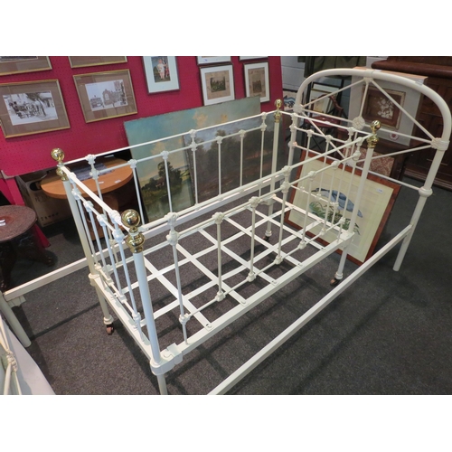 1139 - A painted metal and brass cot