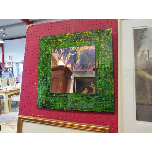 1167 - A square wall mirror with green and orange mosaic frame (40cm x 40cm total)